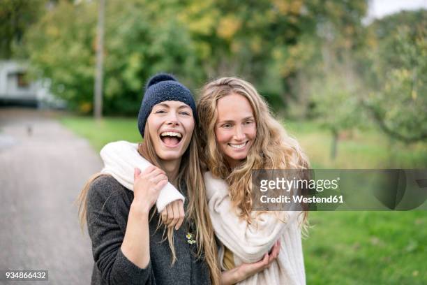 two happy young farmers - farmer female confident stock-fotos und bilder