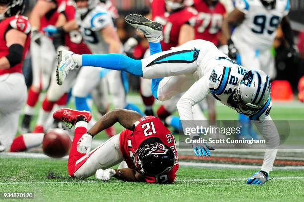 James Bradberry of the Carolina Panthers breaks up a pass intended for Mohamed Sanu of the Atlanta Falcons during the first half at Mercedes-Benz...