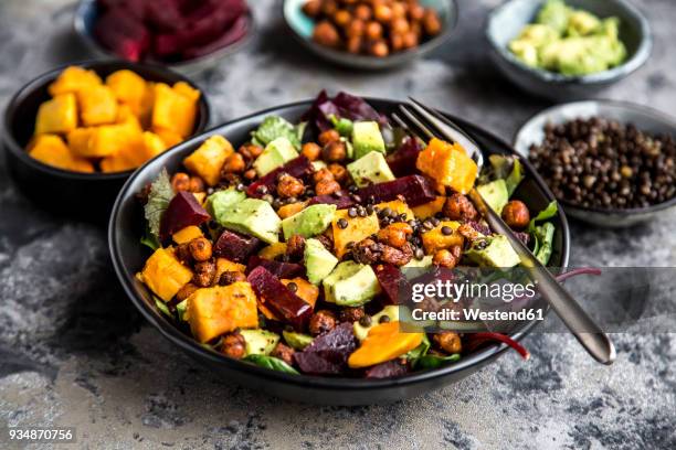 superfood salad, avocado, beetroot, roasted chickpea, sweet potatoe, beluga lentil and blood orange - lentil stock pictures, royalty-free photos & images