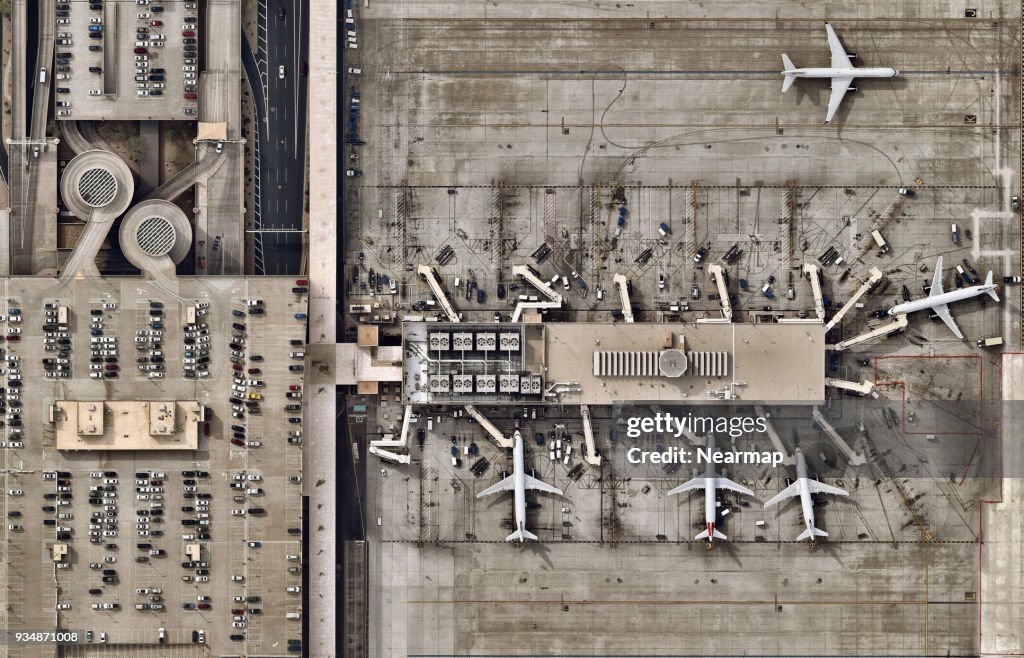 Aiport terminals with planes moving to runway