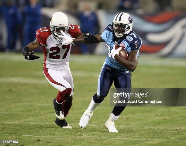 Lavelle Hawkins of the Tennessee Titans makes a catch during the game-winning drive against Michael Adams of the Arizona Cardinals at LP Field on...