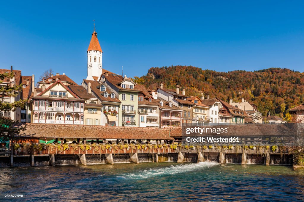 Switzerland, Canton of Bern, Thun, river Aare, old town with parish church and sluice bridge