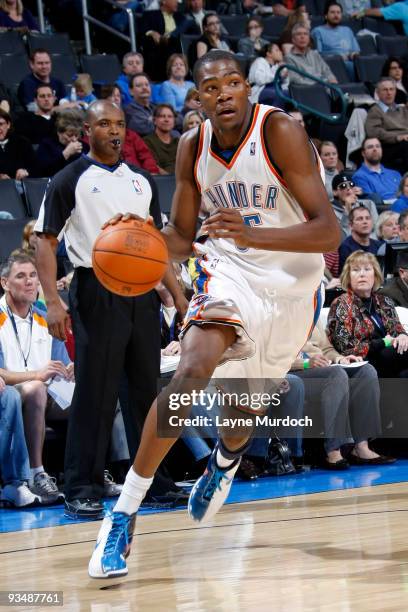Kevin Durant of the Oklahoma City Thunder drives toward the goal during the game against the Houston Rockets on November 29, 2009 at the Ford Center...