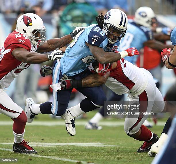 Chris Johnson of the Tennessee Titans carries the ball against the Arizona Cardinals at LP Field on November 29, 2009 in Nashville, Tennessee. The...