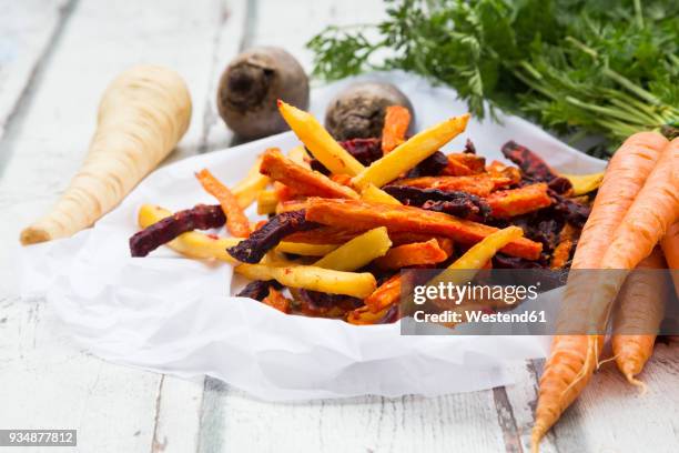 sweet potato, carrot and parsnip fries - pastinake stock-fotos und bilder