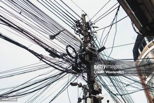 thailand, power cables - order vs chaos stock-fotos und bilder