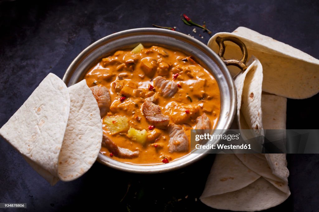 Curry dish with turkey and pineapple in curry sauce