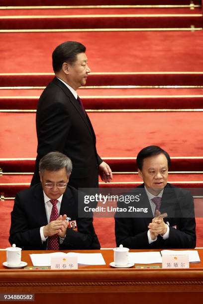 Chinese President Xi Jinping Walk through Vice Premier Hu Chunhua and Chen Miner, secretary of the Chongqing Municipal Party Committee and member of...