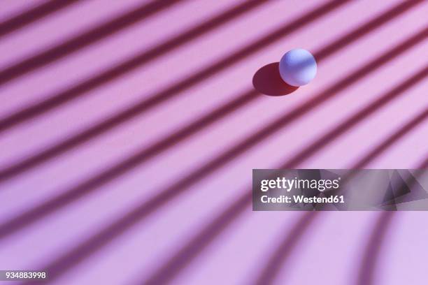 white sphere over a geometric pink background, 3d rendering - rolling stock illustrations