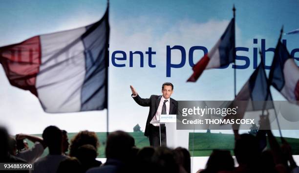 French right-wing presidential candidate of the ruling party Union for a Popular Movement Nicolas Sarkozy delivers a speech during an electoral...