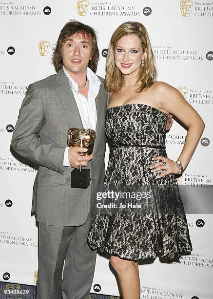 Richard Hammond with Iconic Mask Award and Gemma Bissix poses in the press room at the 'EA British Academy Children's Awards 2009' at The London...