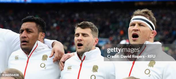 Dylan Hartley, Richard Wigglesworth and Mako Vunipola of England sing the anthem during the NatWest Six Nations match between England and Ireland at...