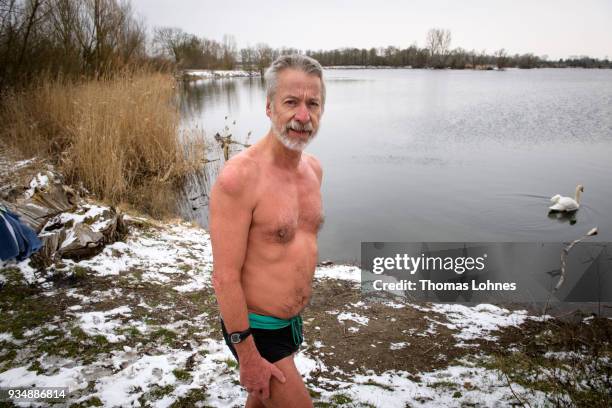 Gustav Meierl and his brother Waldemar Meierl swim in a lake near Biebesheim am Rhein in minus 2 degrees Celcius air temperature on March 19, 2018 in...