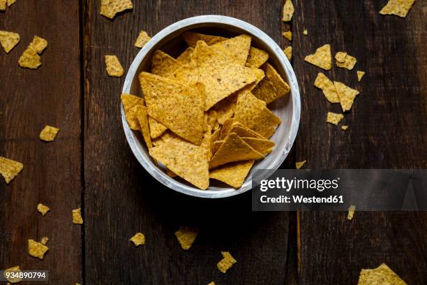 nacho chips in a bowl - tortilla chip stock pictures, royalty-free photos & images