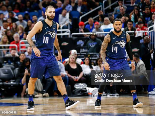 Evan Fournier and D.J. Augustin of the Orlando Magic during the game against the Cleveland Cavaliers at the Amway Center on February 6, 2018 in...