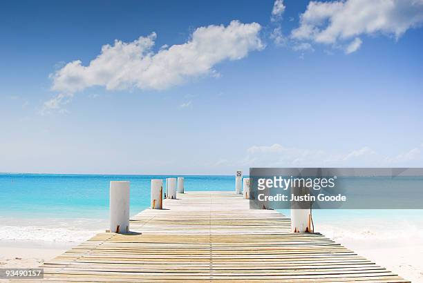 pier on turks and caicos - turks and caicos islands stock pictures, royalty-free photos & images