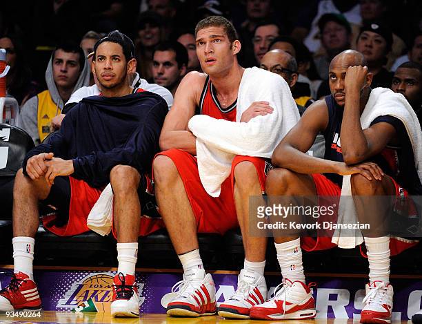 Devin Harris Brook Lopez and Trenton Hassell of the New Jersey Nets reacts after a missed shot by a teammate in the closing minutes of the basketball...