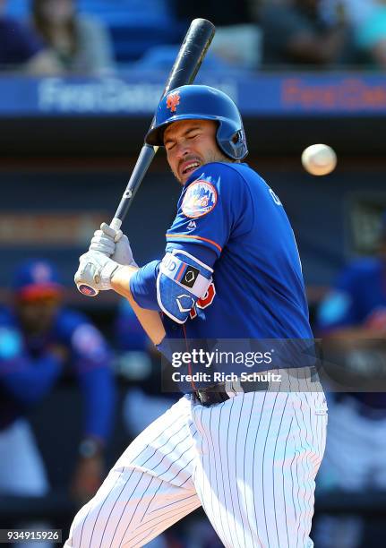 Travis d'Arnaud of the New York Mets in action during a spring training game against the Houston Astros at First Data Field on March 6, 2018 in Port...