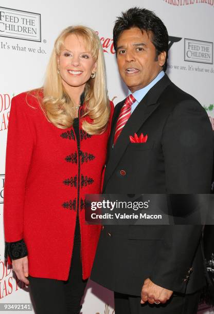 Laura McKenzie and Erik Estrada attends the 2009 Hollywood Christmas Parade on November 29, 2009 in Hollywood, California.