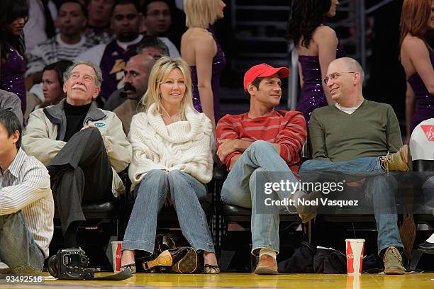 Heather Locklear and Thomas Calabro attend a game between the New Jersey Nets and the Los Angeles Lakers at Staples Center on November 29, 2009 in...