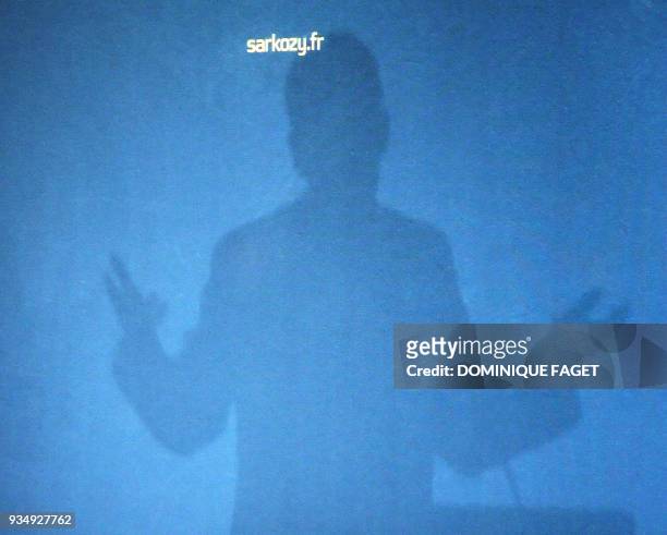 Picture taken 02 April 2007 of a shadow of French right-wing presidential candidate of the ruling Union for a Popular Movement Nicolas Sarkozy on a...
