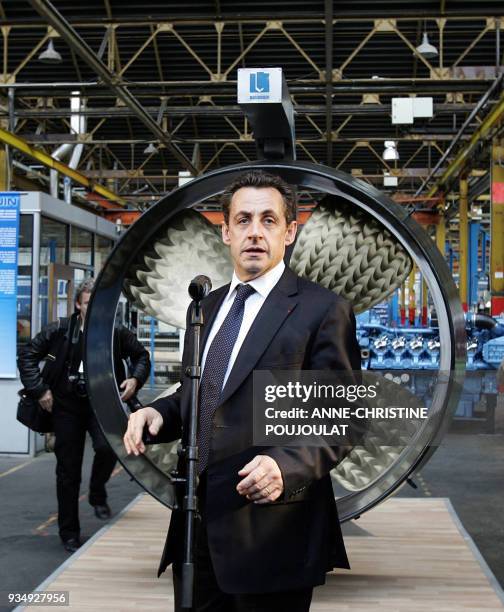 French right-wing presidential candidate Nicolas Sarkozy gets ready to give a speech during his visit of a factory producing boats' motors, 27 march...