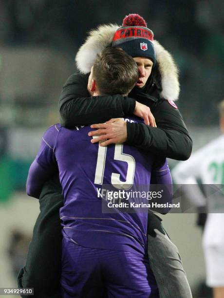 Dennis Kempe and Soeren Bertram of Aue celebrate the victory during the second Bundesliga match between FC Erzgebirge Aue and SpVgg Greuther Fuerth...