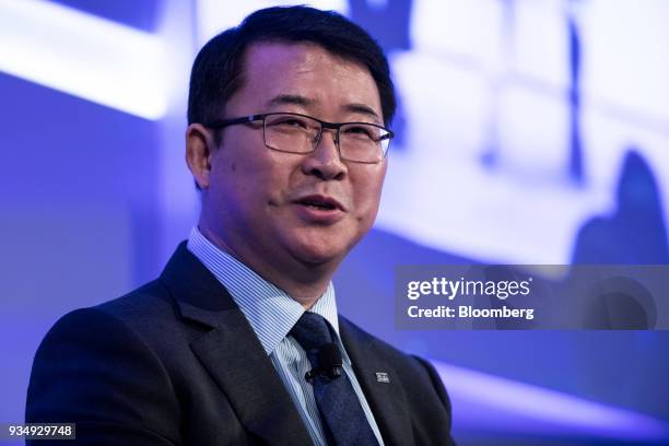 Zhenyi Tang, chairman of CLSA Ltd., speaks during the Credit Suisse Asian Investment Conference in Hong Kong, China, on Tuesday, March 20, 2018. The...