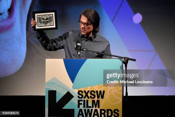 Editor Garret Savage presents the Karen Schmeer Film Editing Fellowship Presentation award at the SXSW Film Awards show during the 2018 SXSW...