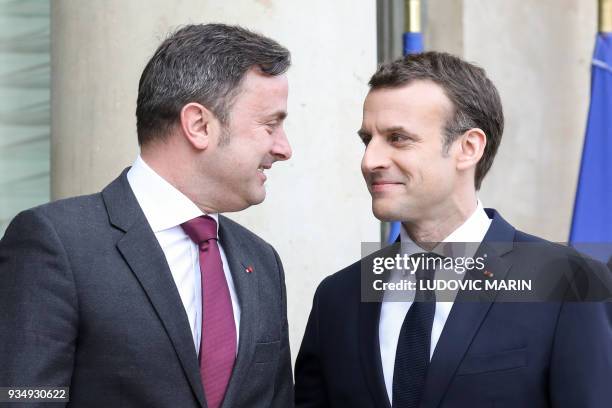 French president Emmanuel Macron welcomes Luxembourg Prime Minister Xavier Bettel upon his arrival at the Elysee presidential palace prior to their...