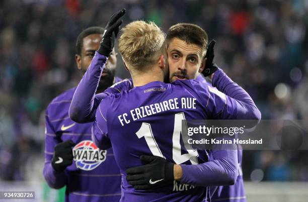 Pascal Koepke and Dimitrij Nazarov of Aue celebrate the opening goal during the second Bundesliga match between FC Erzgebirge Aue and SpVgg Greuther...