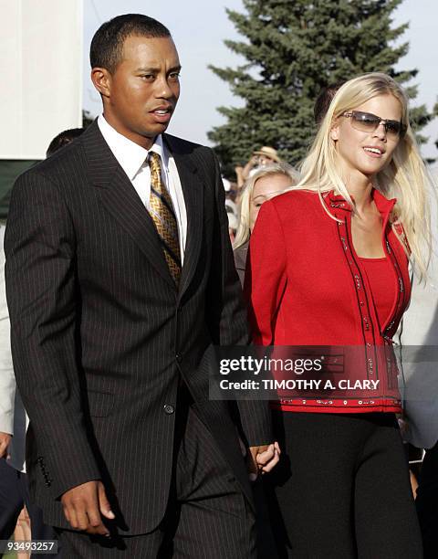This 16 September, 2004 file image shows US golfer Tiger Woods and fiancee Elin Nordegren leaving the opening ceremonies of the Ryder Cup at Oakland...