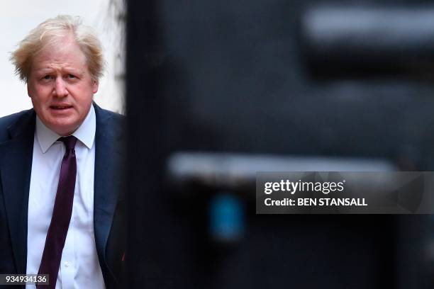 Britain's Foreign Secretary Boris Johnson arrives at Downing Street in central London on March 20, 2018 for the weekly meeting of the cabinet. -...