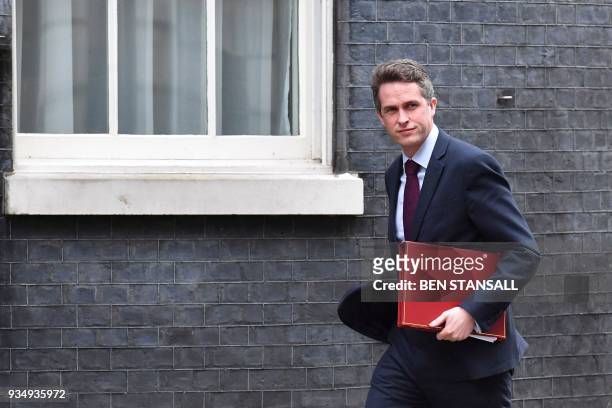 Britain's Defence Secretary Gavin Williamson arrives at Downing Street in central London on March 20, 2018 for the weekly meeting of the cabinet. -...