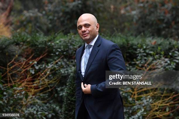 Britain's Housing, Communities and Local Government Secretary Sajid Javid arrives at Downing Street in central London on March 20, 2018 for the...