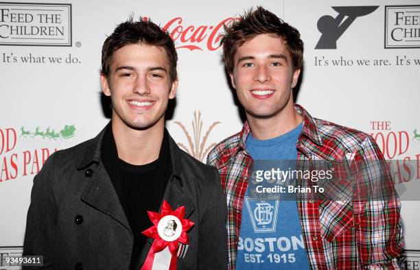 Asher Book and Paul McGill attend the 2009 Hollywood Christmas Parade on November 29, 2009 in Hollywood, California.