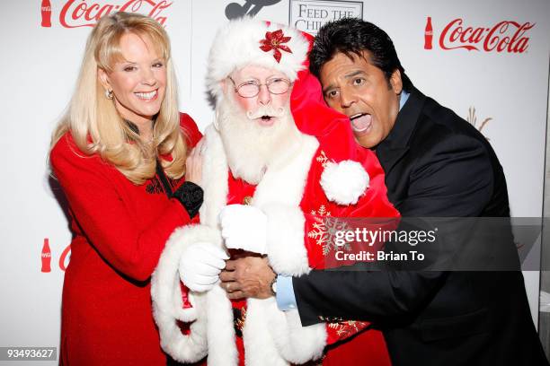 Laura McKenzie, Santa Claus, and Erik Estrada attend the 2009 Hollywood Christmas Parade on November 29, 2009 in Hollywood, California.