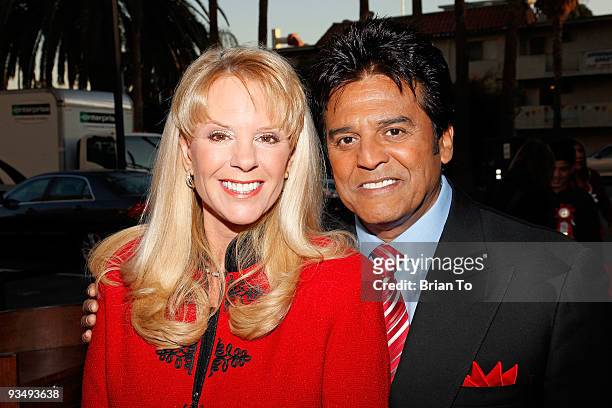 Laura McKenzie and Erik Estrada attend the 2009 Hollywood Christmas Parade on November 29, 2009 in Hollywood, California.
