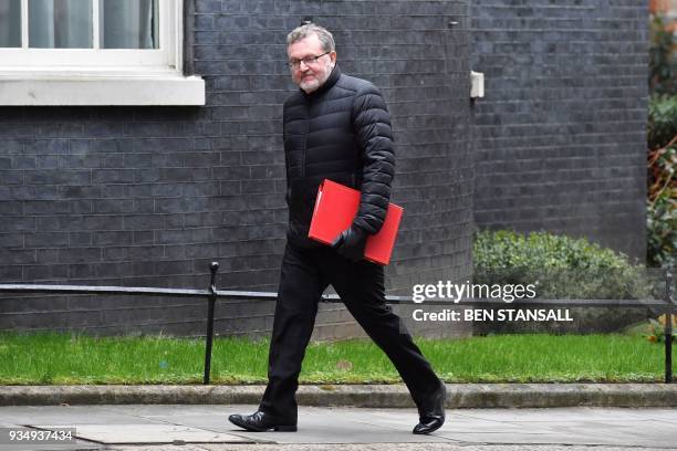 Britain's Scotland Secretary David Mundell arrives at Downing Street in central London on March 20, 2018 for the weekly meeting of the cabinet. -...