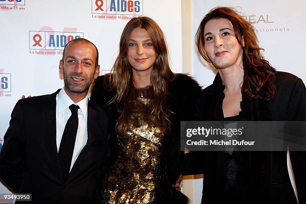 Daria Werbowy, guest and Youcef Nabi, President of Lancome, attend the dinner to celebrate the 25th anniversary of AIDS International at Les...