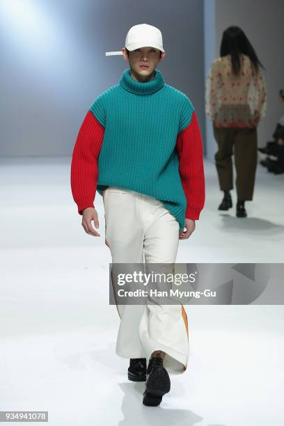 Model displays the creation by Caruso on the runway during the HERA Seoul Fashion Week F/W 2018 at DDP on March 20, 2018 in Seoul, South Korea.