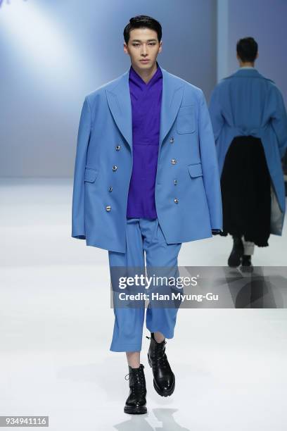 Model displays the creation by Caruso on the runway during the HERA Seoul Fashion Week F/W 2018 at DDP on March 20, 2018 in Seoul, South Korea.