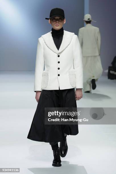 Model displays the creation by Caruso on the runway during the HERA Seoul Fashion Week F/W 2018 at DDP on March 20, 2018 in Seoul, South Korea.