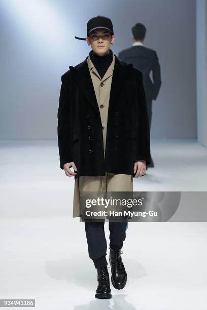 Model displays the creation by Caruso on the runway during the HERA Seoul Fashion Week F/W 2018 at DDP on March 20, 2018 in Seoul, South Korea.