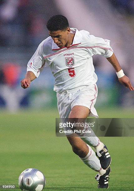 Ziad Jaziri of Tunisia runs with the ball during the 2002 World Cup Qualifier against Ivory Coast played at the El Menzah Stadium in Tunis, Tunisia....