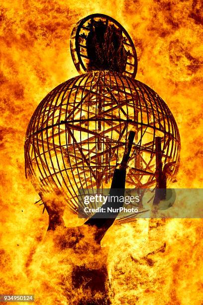 Ninot' depicting the World and the Euro currency burns during the last day of the Las Fallas Festival on March 19, 2018 in Valencia, Spain. The...