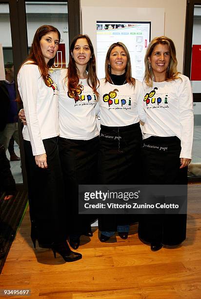 Claudia Cambiasso, Sofia Milito, Cecilia Samuel, Paula Zanetti, attend P.U.P.I. Shop opening on November 27, 2009 in Milan, Italy. The P.U.P.I. Is a...