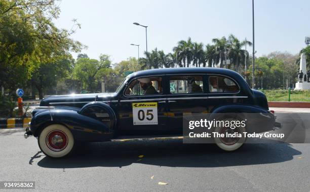 Vintage car is driven out of the Constitution Club of India on to the streets during the JK Tyre Constitution Club of India Parliamentarian Car Rally...