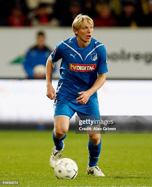 Andreas Beck of Hoffenheim runs with the ball during the Bundesliga match between 1899 Hoffenheim and Borussia Dortmund at the Rhein-Neckar Arena on...