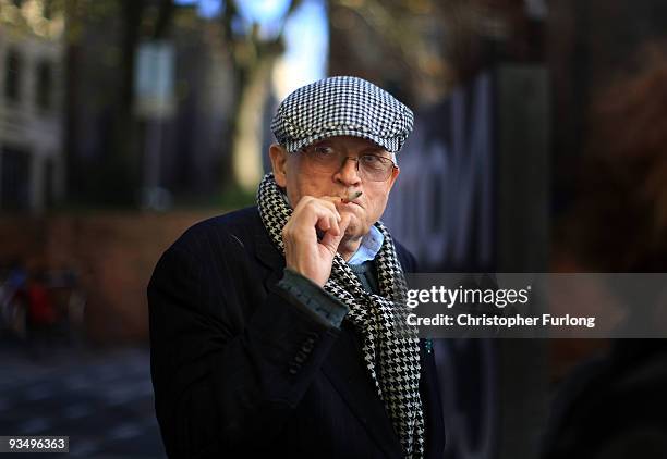 Artist David Hockney smokes a cigarette during a break from a tour of the new Nottingham Contemporary art space which is holding a major...